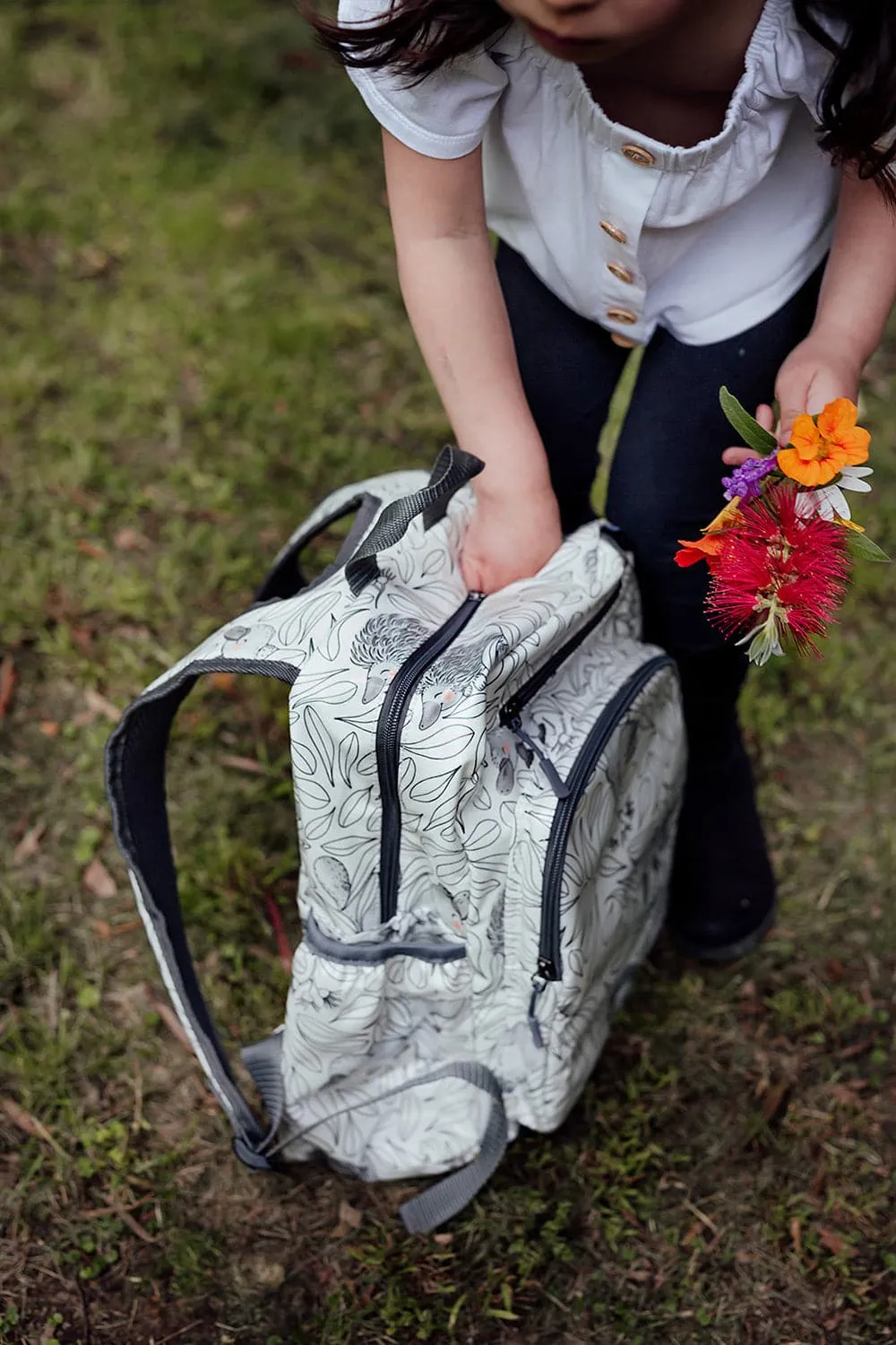 Cuddly Faces Expect-A-Spill Backpack